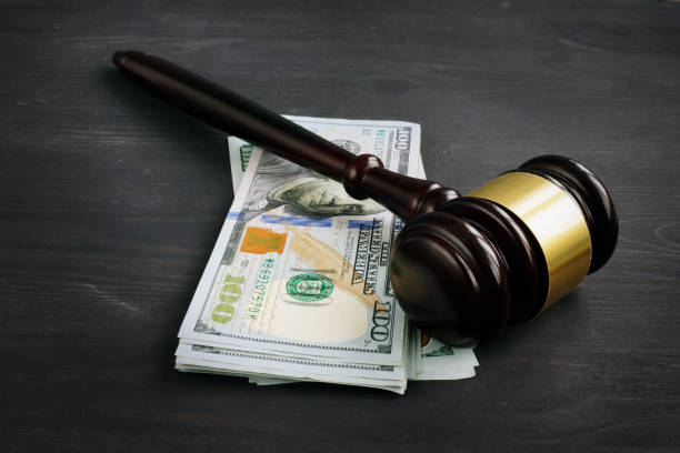 Gavel on a stack of money