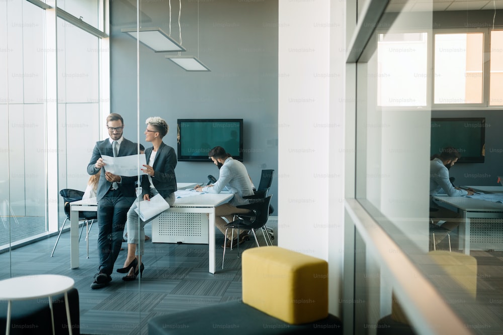Team members reviewing a document in the office