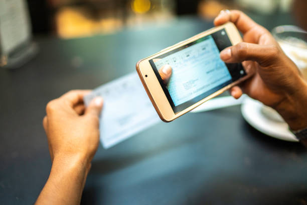 Man depositing a mobile check with his phone